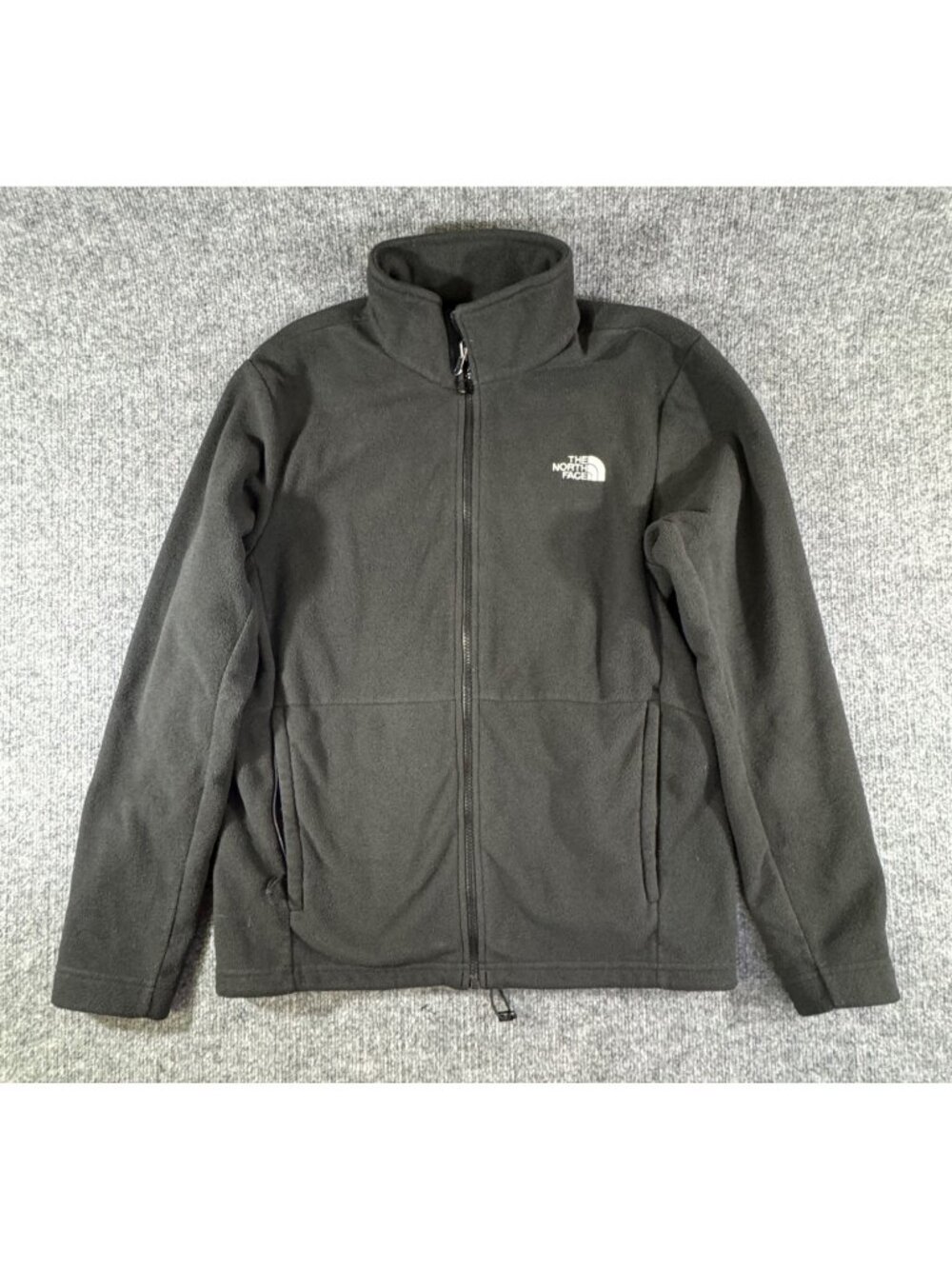 the North face mens size Medium grey fleece jacket with pocketd zip up